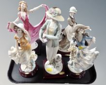 A tray of five Armani figures of ladies.