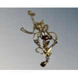 A 9ct gold Art Nouveau necklace set with red and white stones (approx 2.75g).