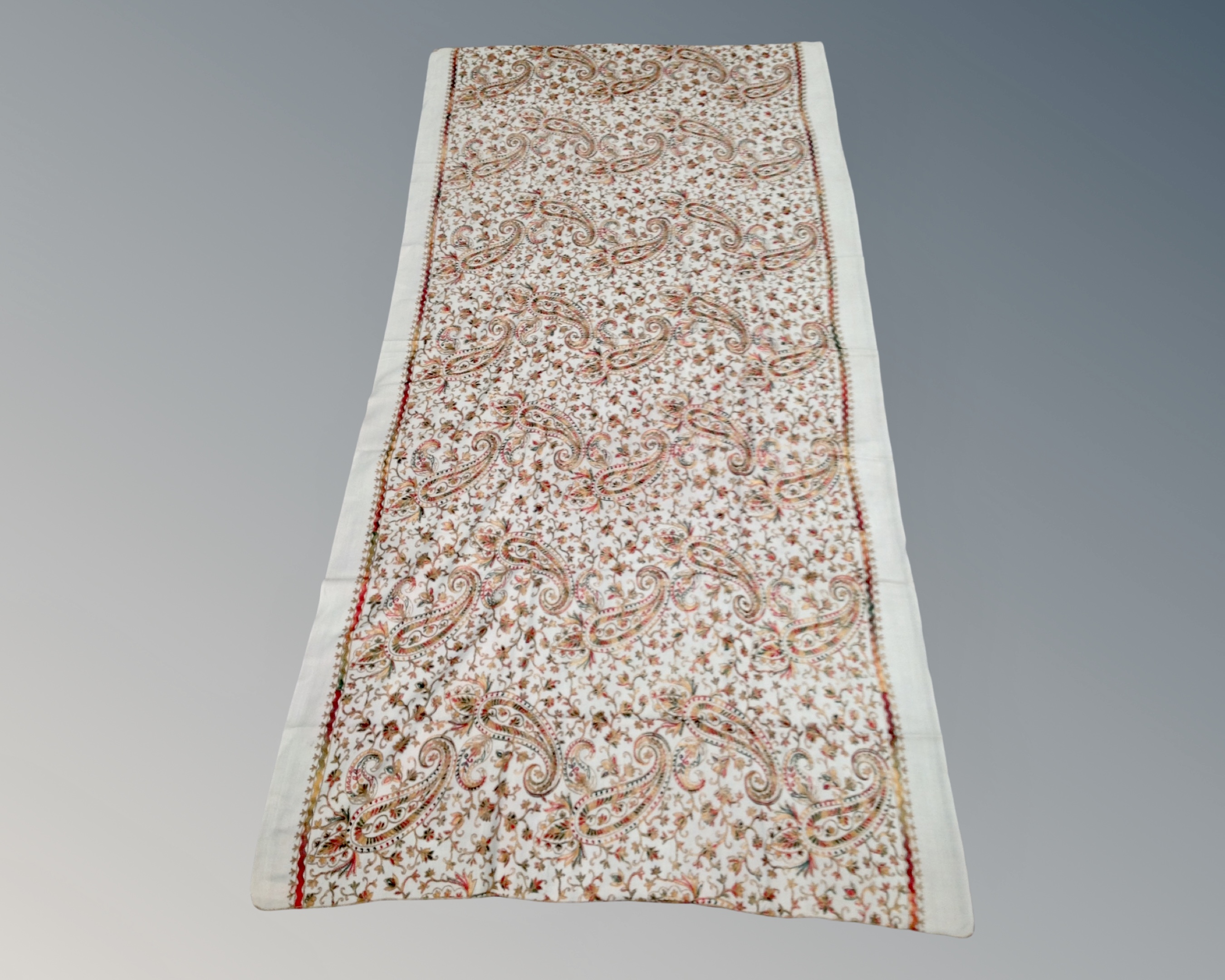 An embroidered wool shawl,