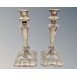 A pair of Victorian plated candlesticks.