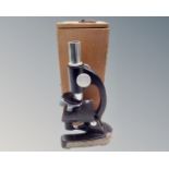 A Philo microscope in box.