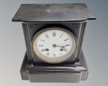 A Victorian slate mantel clock.