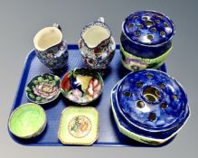 A tray of Maling lustre china and Ringtons chintz jugs.