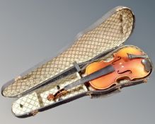 A violin in case.