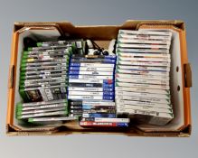 A box of Nintendo Wii games, Playstation 4 and other X Box one games,