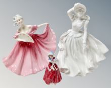 Three Royal Doulton figures, Elaine HN3307, Christmas Morn' HN3212 and one further.