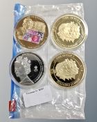 Four large commemorative Queen Elizabeth II coins (4)