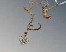 A 9ct gold fine chain with letter 'C' pendant,