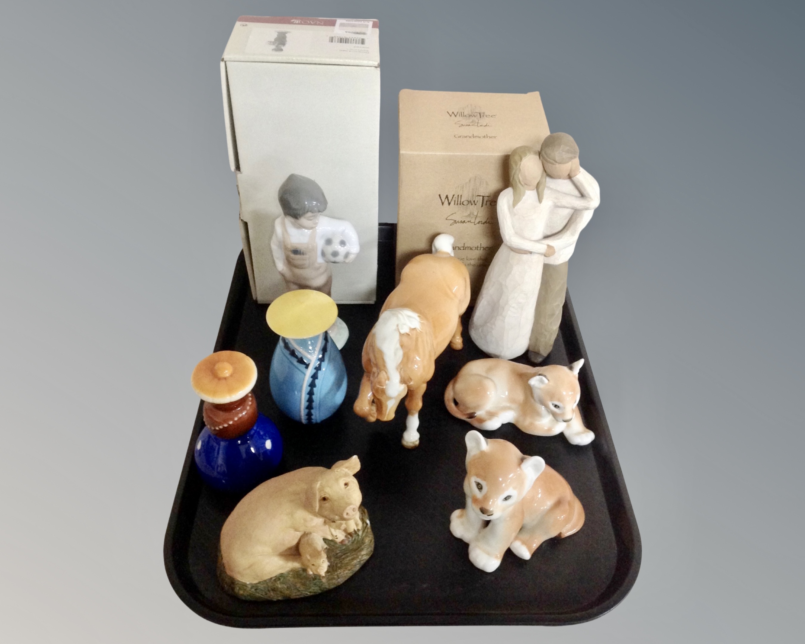 A tray of assorted ceramics, figures including Beswick horse, USSR animal figures,
