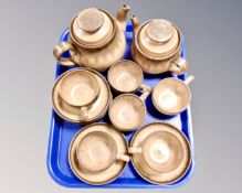 A quantity of Denby stoneware coffee china.