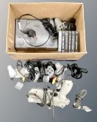 A box of six Playstation games, controller,