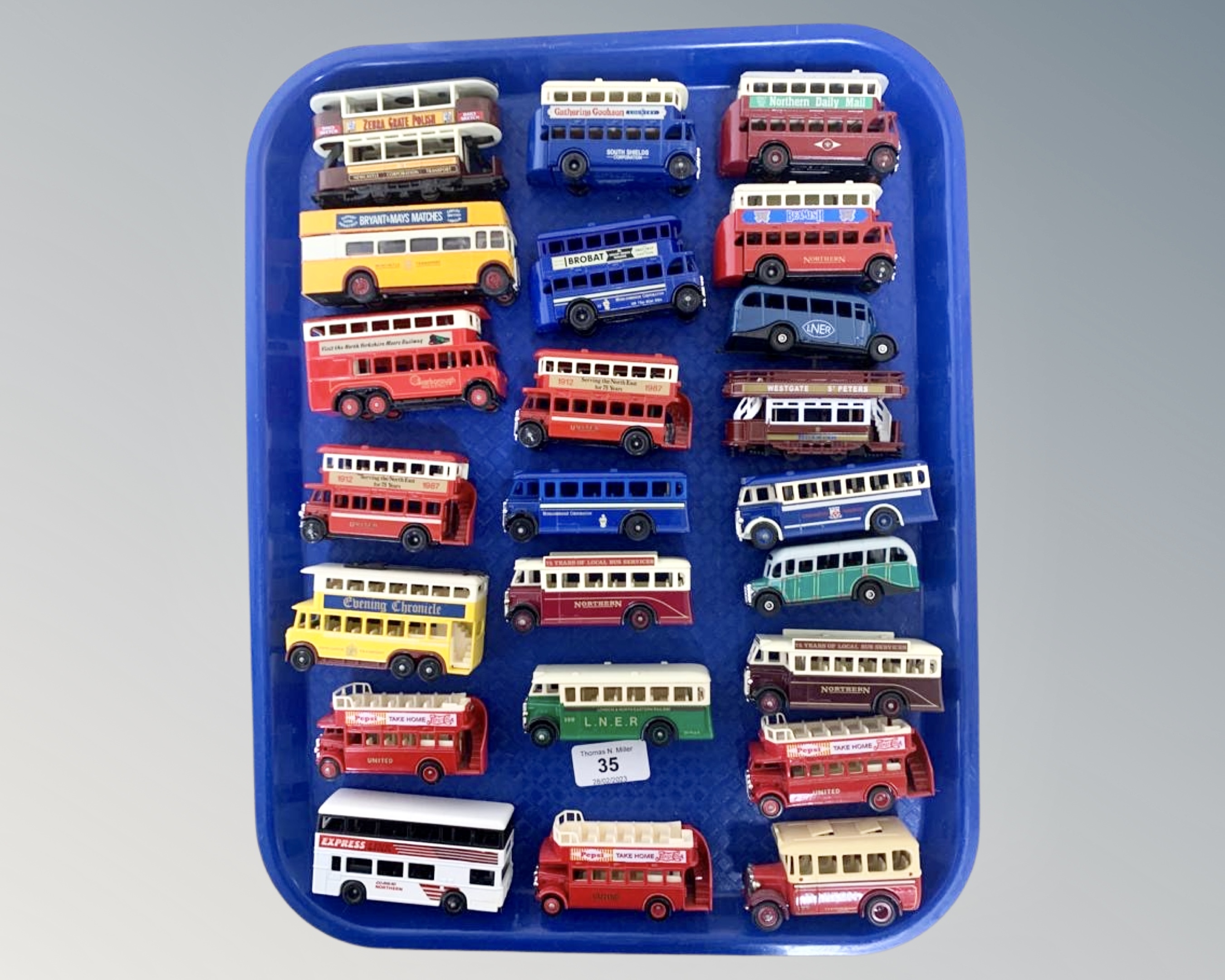 A collection of twenty-three unboxed die cast models, all busses and trams, by Days Gone, Lledo,