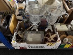 A box of tin wall signs, pair of glass table stands, barbola type table lamp,