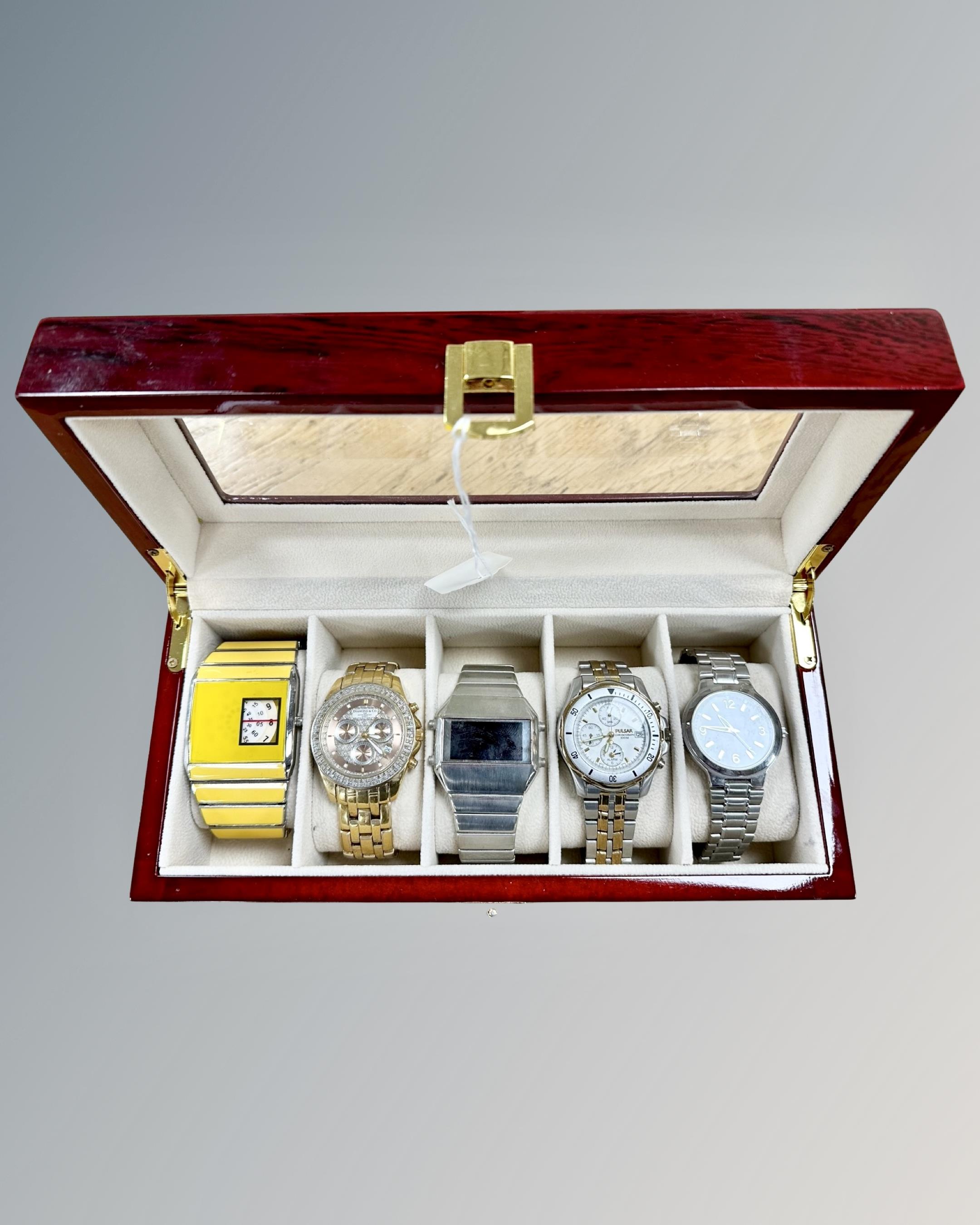A modern watch box containing five gent's watches comprising Ben Sherman, Pulsar,