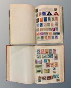 A Stanley Gibbons Swiftsure Expanding Stamp Album containing a collection of world stamps,