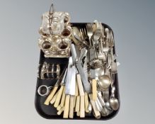 A tray of silver plated antique and later cutlery, egg stand etc.