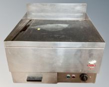 A stainless steel electric commercial griddle.