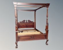 A hardwood Victorian style four poster bed frame (king-size mattress)