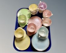 A tray of Maling lustre teacup and sandwich plate pairs.