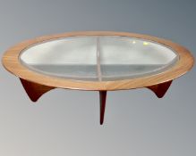 A 20th century teak G Plan oval coffee table,