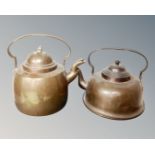 Two vintage copper kettles.