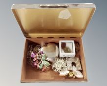 A silver plated cigarette box and contents including large silver heart pendant,