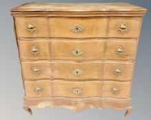 A 19th century oak four drawer serpentine chest on chest with brass handles and mounts (a/f)