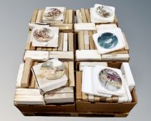 A palette containing approximately 90 boxed collectors plates, including Bradex, Danbury Mint,