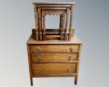 A 1930s oak three drawer chest together with an oak occasional table.