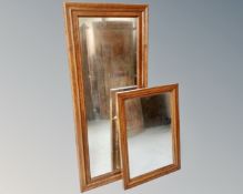 Two antique wall mirrors.