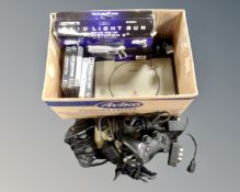 A box of five Playstation games, console,