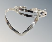 A 925 silver chevron torque bracelet together with a split double 925 silver bracelet