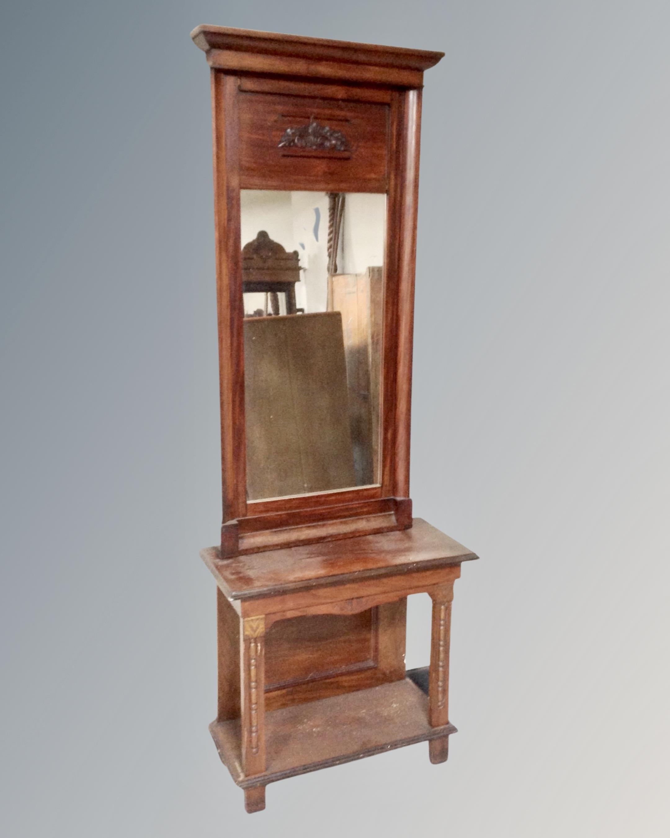 A 19th century mahogany hall table with mirror.