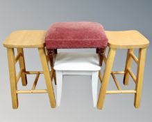 A pair of breakfast bar stools together with a dressing table stool and a further footstool