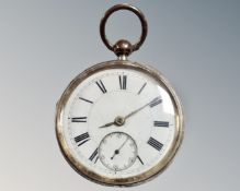An antique silver pocket watch
