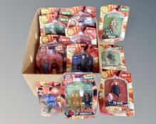 A box containing a large quantity of Doctor Who series figures, sealed.