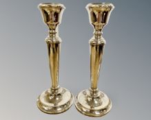 A pair of Elizabeth II loaded silver candlesticks, S J Rose & Son, Birmingham 1968, height 23cm.