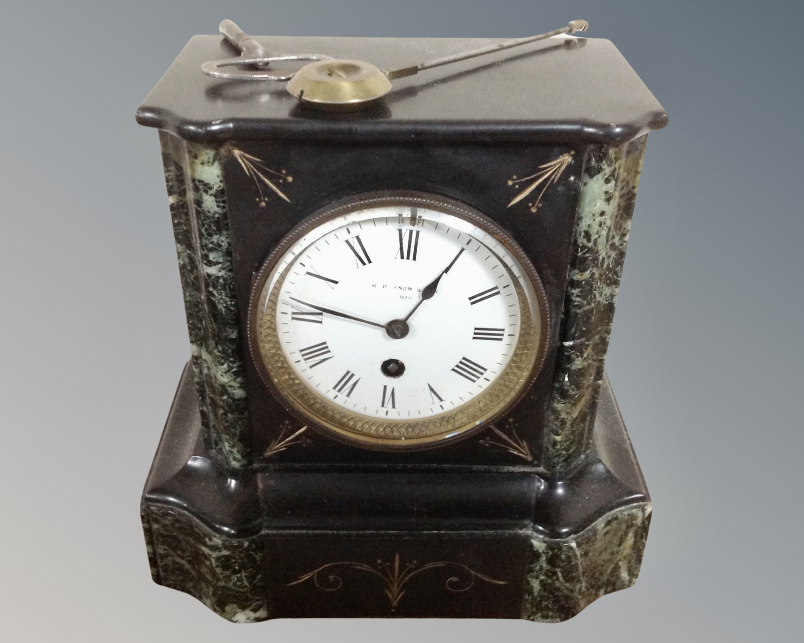 A Victorian marble and slate mantel clock,