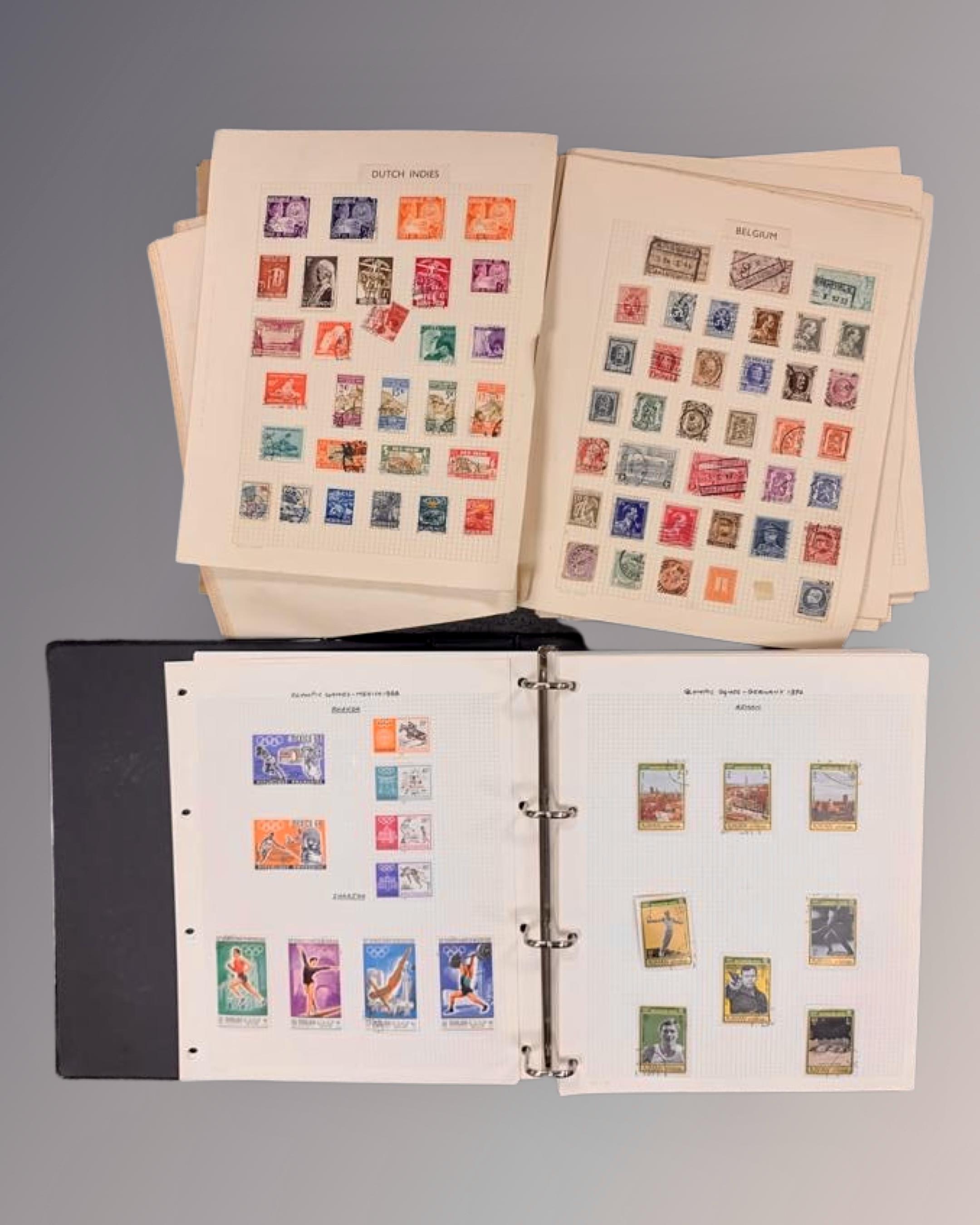 A Globe Super Stamp Album containing a collection of world stamps,