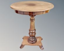 A 19th century oval mahogany pedestal occasional table fitted a drawer