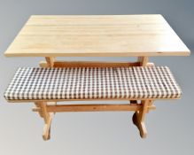 A pine refectory kitchen table with bench