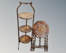 An Edwardian oak barley twist folding occasional table together with a three tier cake stand.