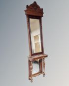 A 19th century mahogany hall mirror and similar hall table