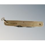 A 9ct gold mounted folding knife, length folded 63mm.