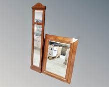 An antique mahogany bevel edged wall mirror together with a further mahogany hall mirror.