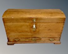 A 19th century domed topped shipping trunk, fitted with a drawer,
