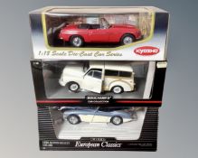 Three 1:18 scale die cast vehicles : Mini Champs car collections,