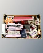 A box containing a quantity of perfumes, gift sets, body care sets etc.