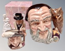 A Royal Doulton character jug of Merlin, together with a further character jug of Aramis (small),