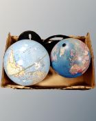 Two globes on stands